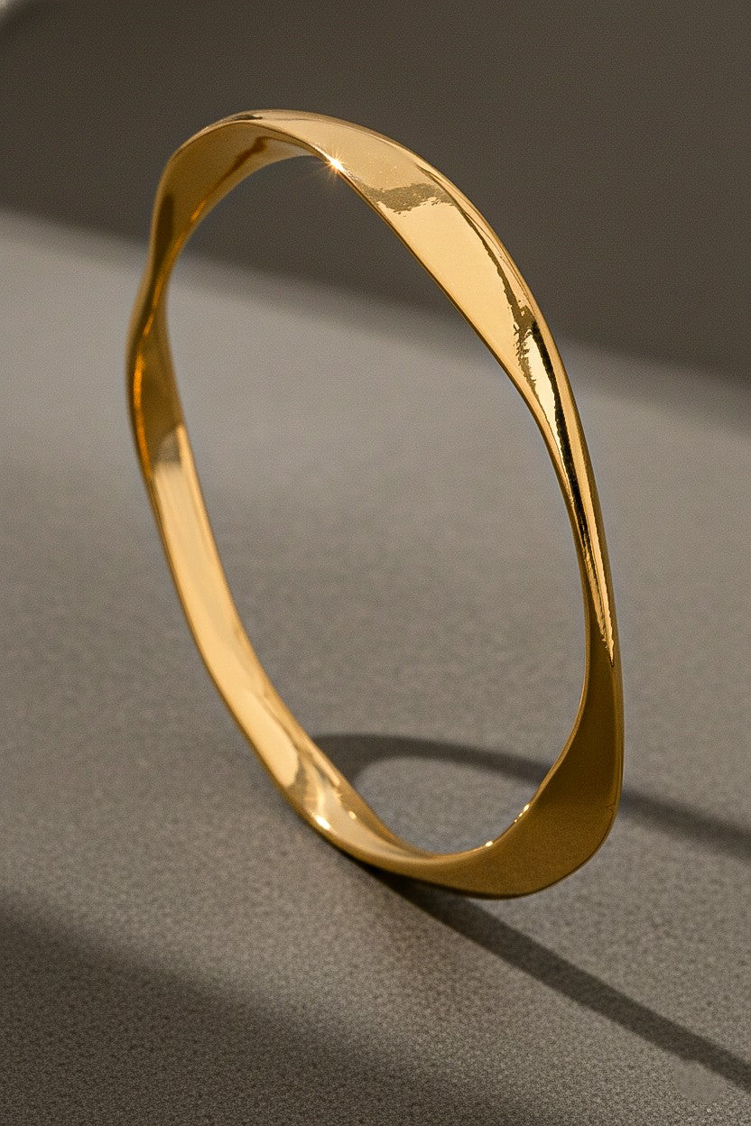 Sculpted Twist Gold Bangle